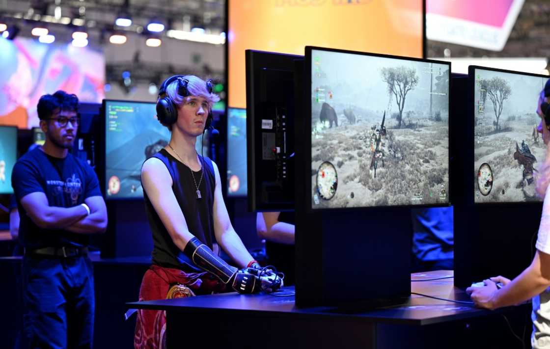 Gamescom, the video game industry's biggest trade show, attracted people who wanted to play 'Monster Hunter Wilds'. Gamescom, the video game industry's biggest trade show, attracted people who wanted to play 'Monster Hunter Wilds'.