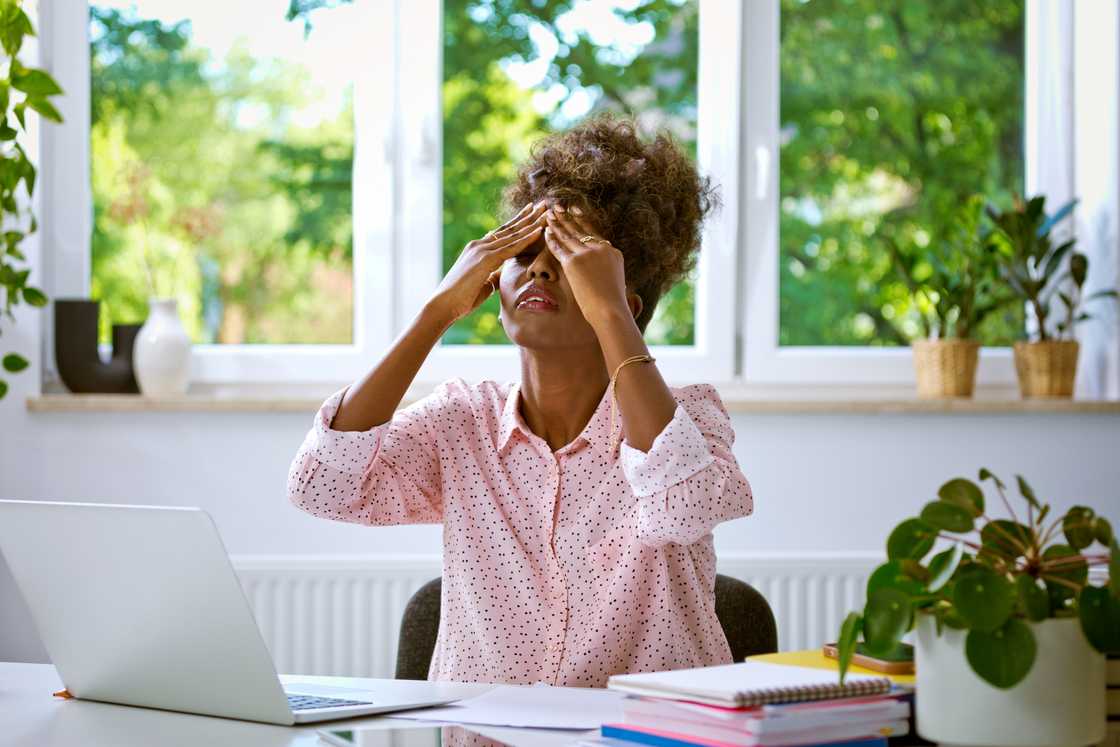 A frustrated woman in an office