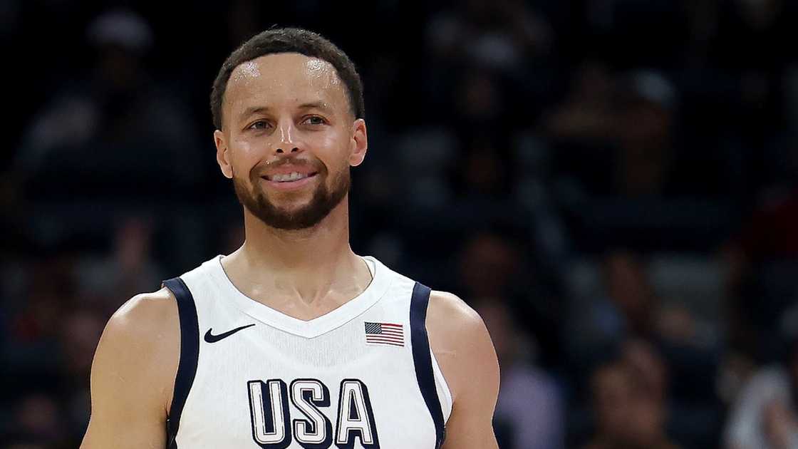 Stephen Curry walks on to the court during a match.