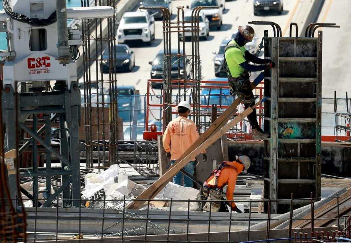 US hiring rose by 303,000 last month US hiring rose by 303,000 last month