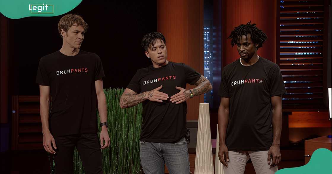 Three men demonstrate the DrumPants technology during the company's Shark Tank presentation.