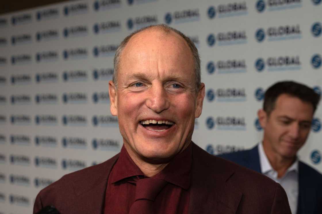 Woody Harrelson smiling at the Be Beautiful Be Yourself Fashion Show at the Sheraton Downtown Denver Hotel Woody Harrelson smiling at the Be Beautiful Be Yourself Fashion Show at the Sheraton Downtown Denver Hotel
