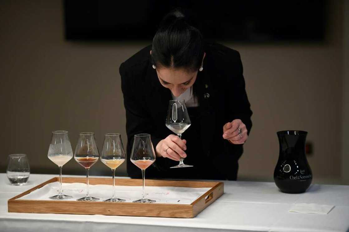 Candidate Valeria Gamper of Argentina takes part in a cocktail-tasting trial at the championships Candidate Valeria Gamper of Argentina takes part in a cocktail-tasting trial at the championships