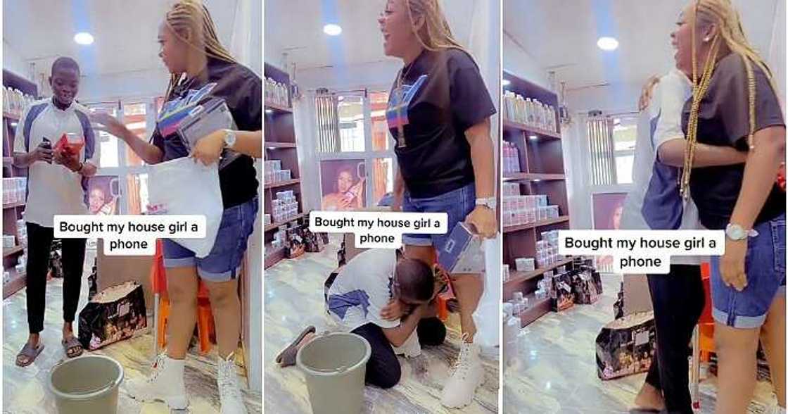 Lady gifts house help, a phone, kneels Lady gifts house help, a phone, kneels