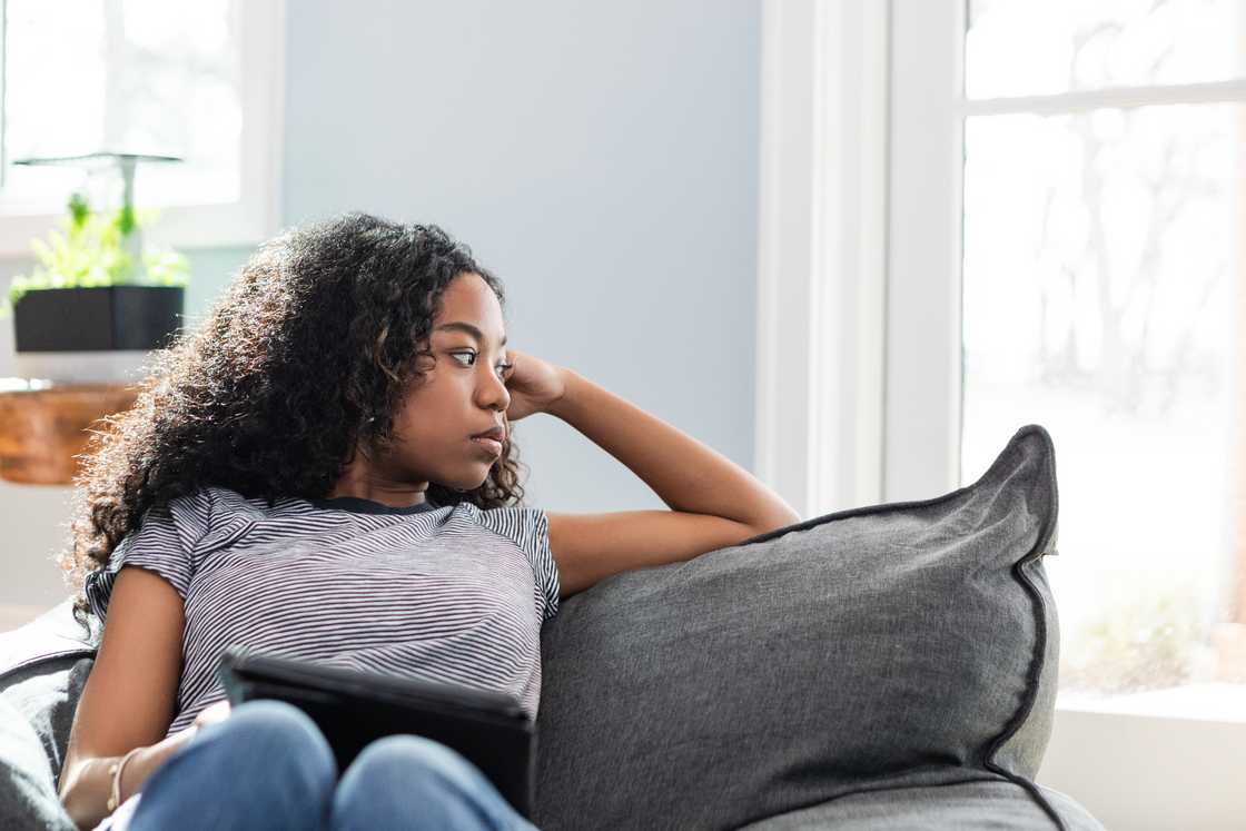 Teenage girl contemplating Teenage girl contemplating