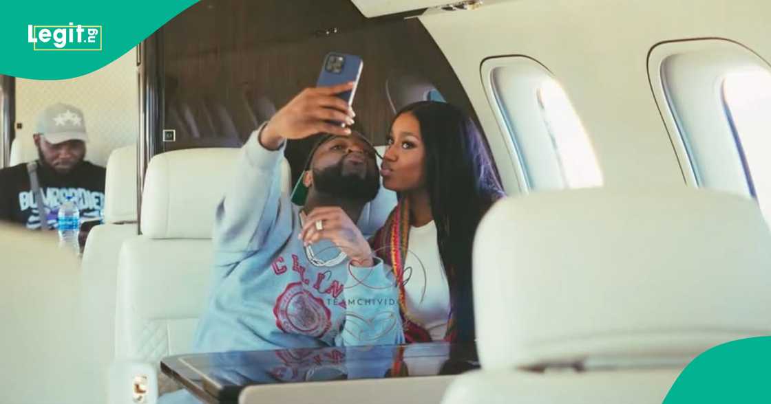 Davido and Chioma taunts singles with a kiss. Davido and Chioma taunts singles with a kiss.