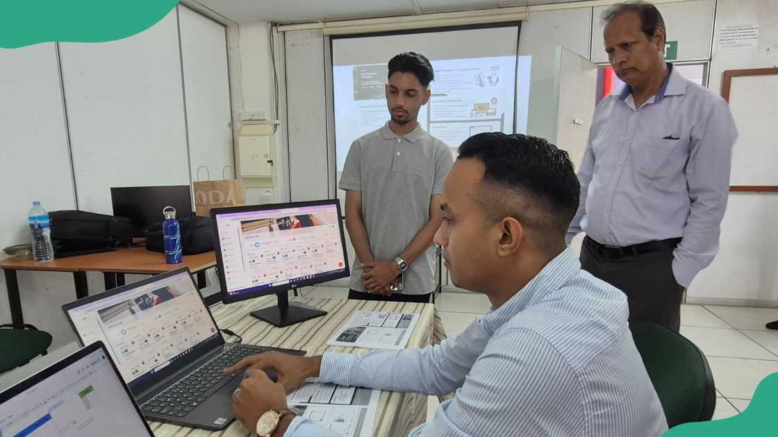 UTM students reviewing data.