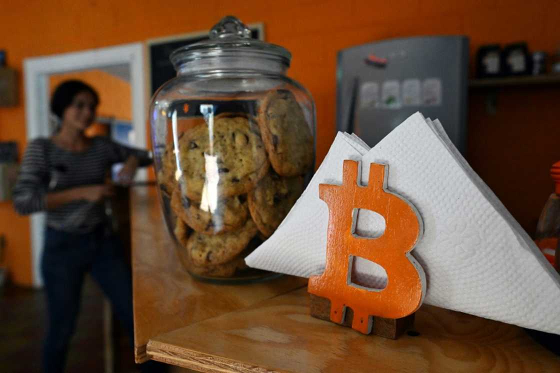 A napkin holder with the bitcoin sign is seen in a cafe in Berlin, El Salvador