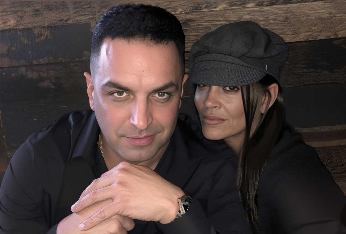 Dino Guilmette pose sitting with Elizabeth McGraw