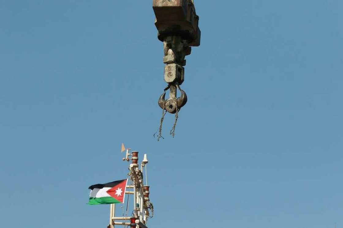 The remains of the snapped cable still hang from the crane after Monday's accident on the dockside in Aqaba