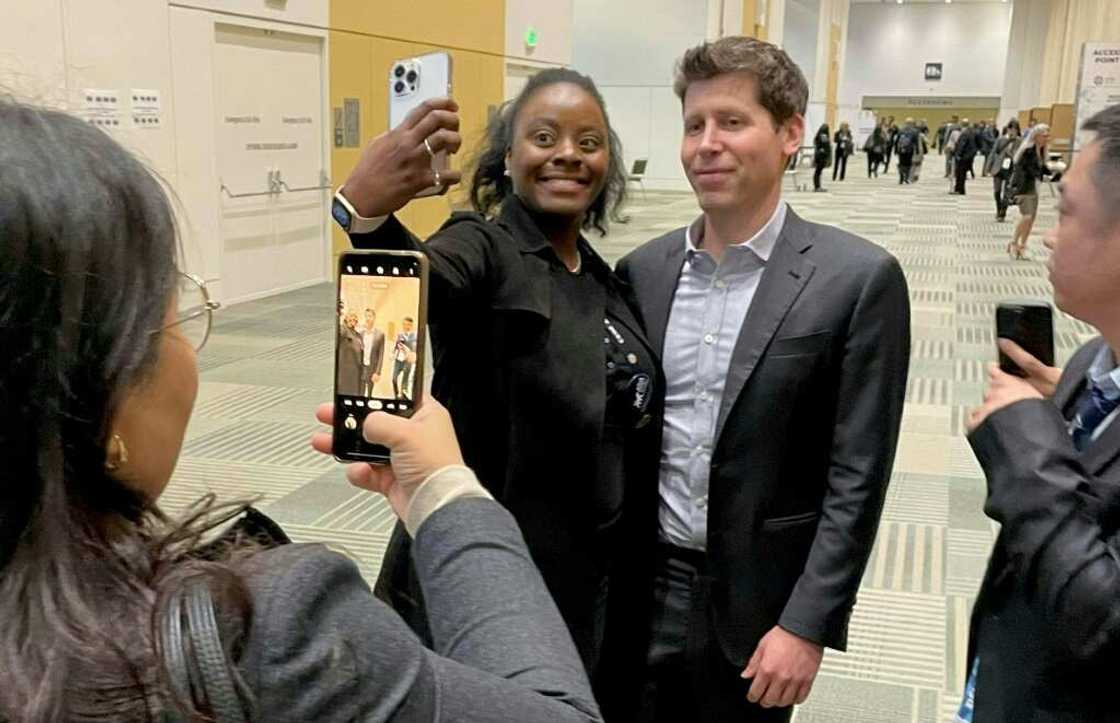 Sam Altman, former CEO of OpenAI, takes photos with attendees during the Asia-Pacific Economic Cooperation (APEC) Leaders' Week in San Francisco Sam Altman, former CEO of OpenAI, takes photos with attendees during the Asia-Pacific Economic Cooperation (APEC) Leaders' Week in San Francisco