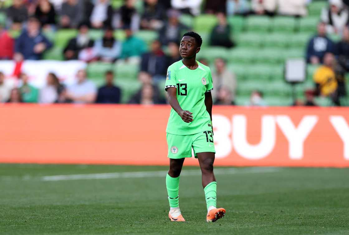 Deborah Abiodun walks out of the field after receiving a red card during a match between Nigeria and Canada