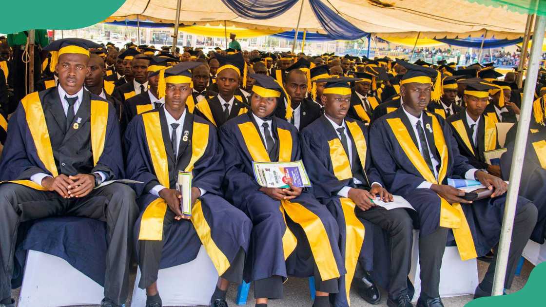 POLAC students in graduation gowns.