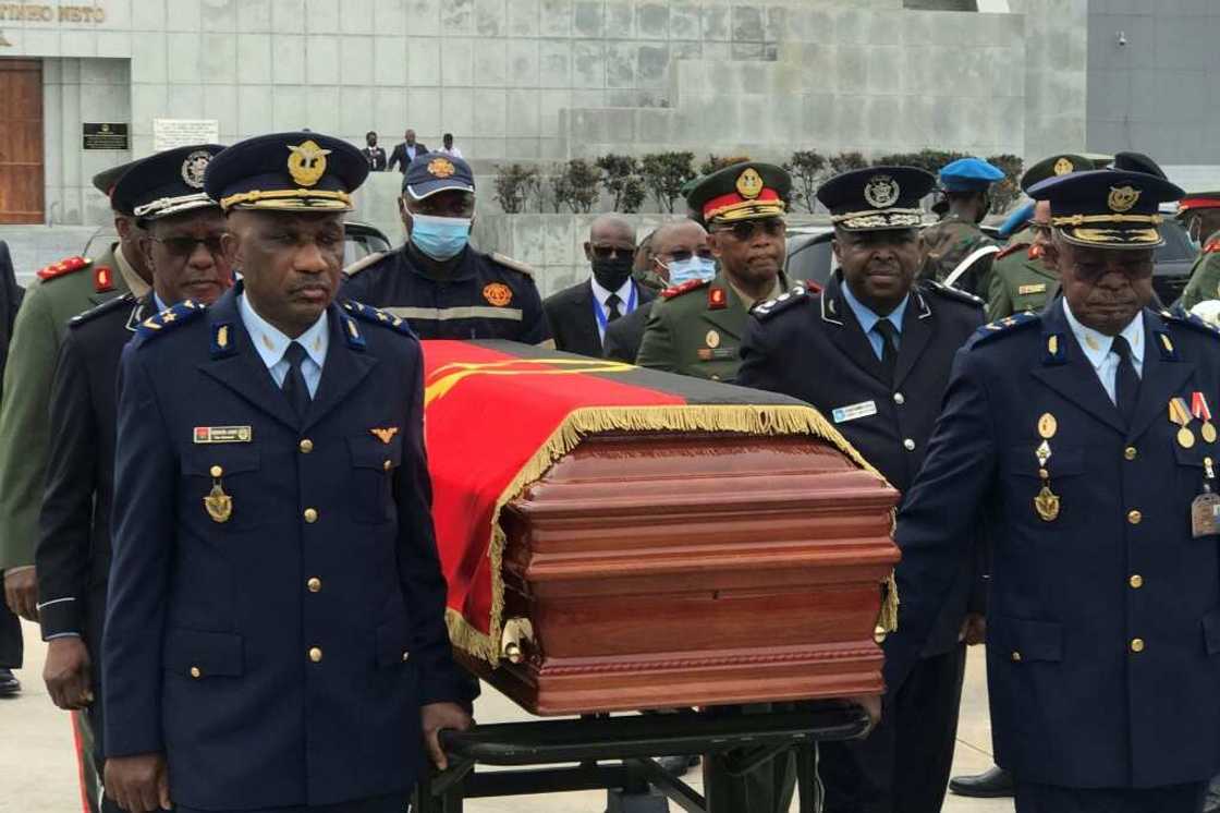 The cortege carrying the remains of former Angolan President Jose Eduardo Dos Santos arrives at the Praca da Republica in Luanda on August 27, 2022, where he will lie in state ahead of his funeral The cortege carrying the remains of former Angolan President Jose Eduardo Dos Santos arrives at the Praca da Republica in Luanda on August 27, 2022, where he will lie in state ahead of his funeral