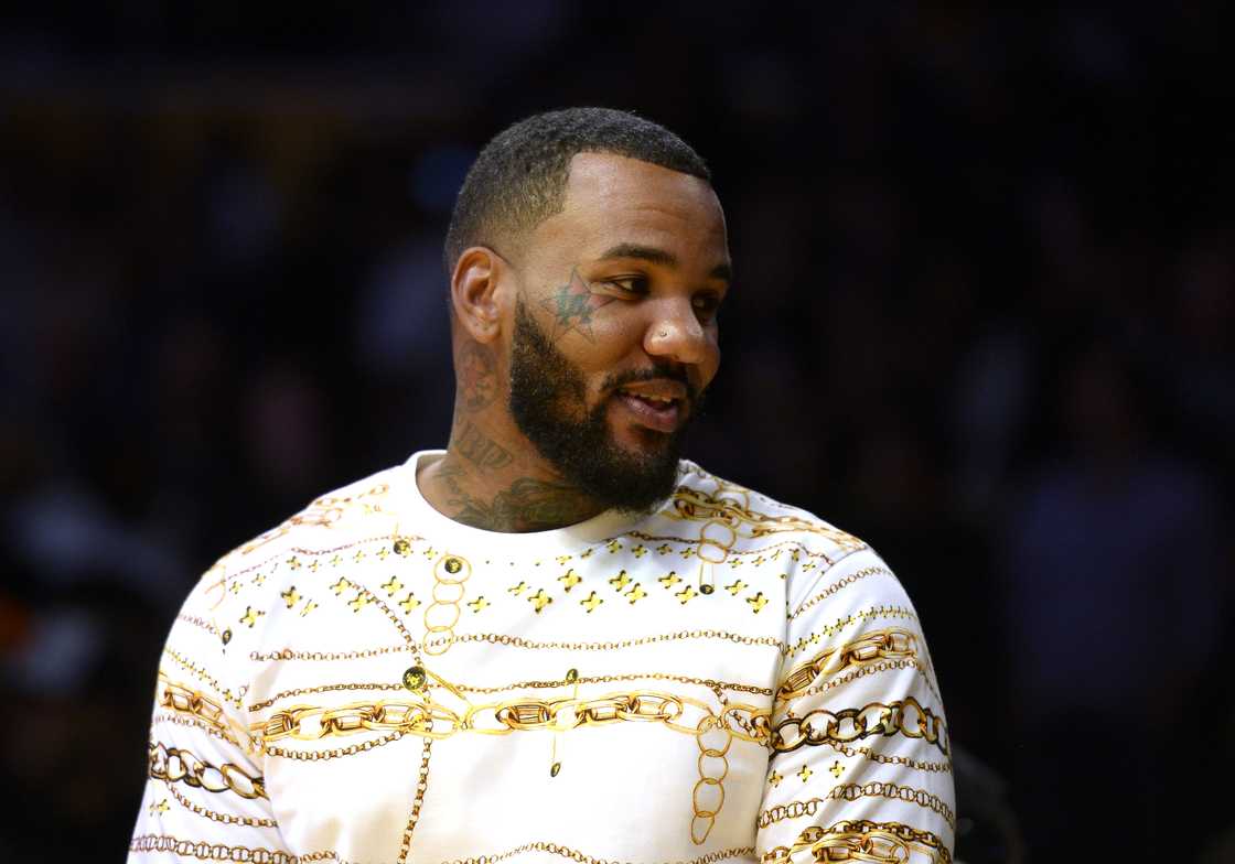 Rapper The Game attends Portland Trail Blazers and Los Angeles Lakers pre-season basketball game at Staples Centre in Los Angeles, California Rapper The Game attends Portland Trail Blazers and Los Angeles Lakers pre-season basketball game at Staples Centre in Los Angeles, California