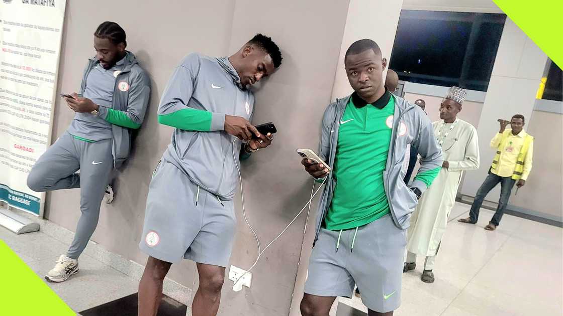 Super Eagles players look dejected after arriving in Nigeria from Libya.