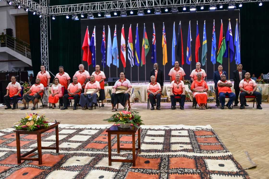 Tonga's Crown Prince Tupouto'a 'Ulukalala (centre L), UN chief Antonio Guterres (centre R) and other leaders attend the Pacific Islands Forum on Monday