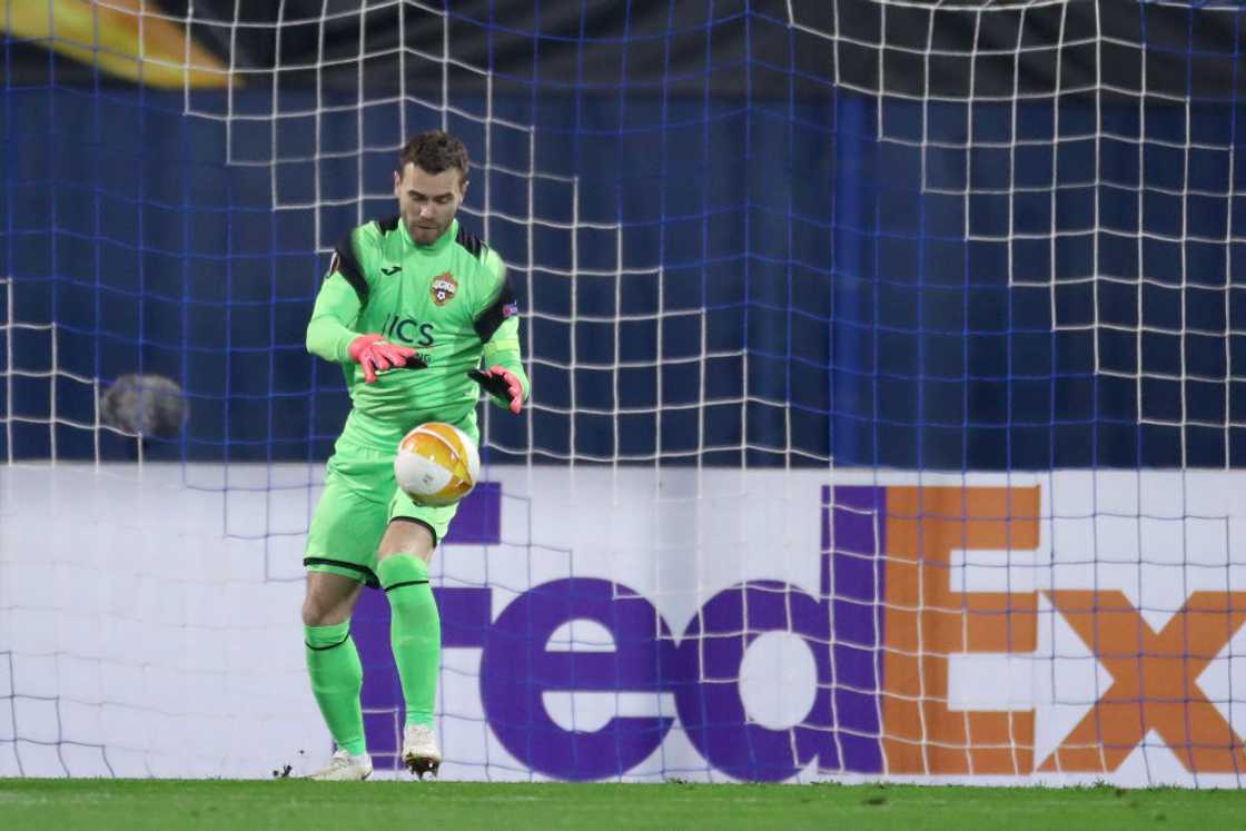 Igor Akinfeev of CSKA Moscow controls the ball