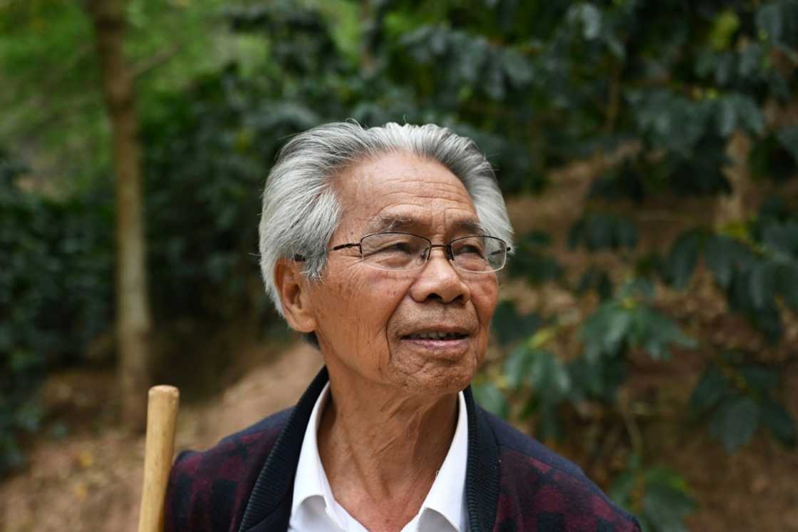 Liao Xiugui looking out over the Xiaowazi, or Little Hollow, coffee plantation in Pu’er, in China’s southwest Yunnan province Liao Xiugui looking out over the Xiaowazi, or Little Hollow, coffee plantation in Pu’er, in China’s southwest Yunnan province