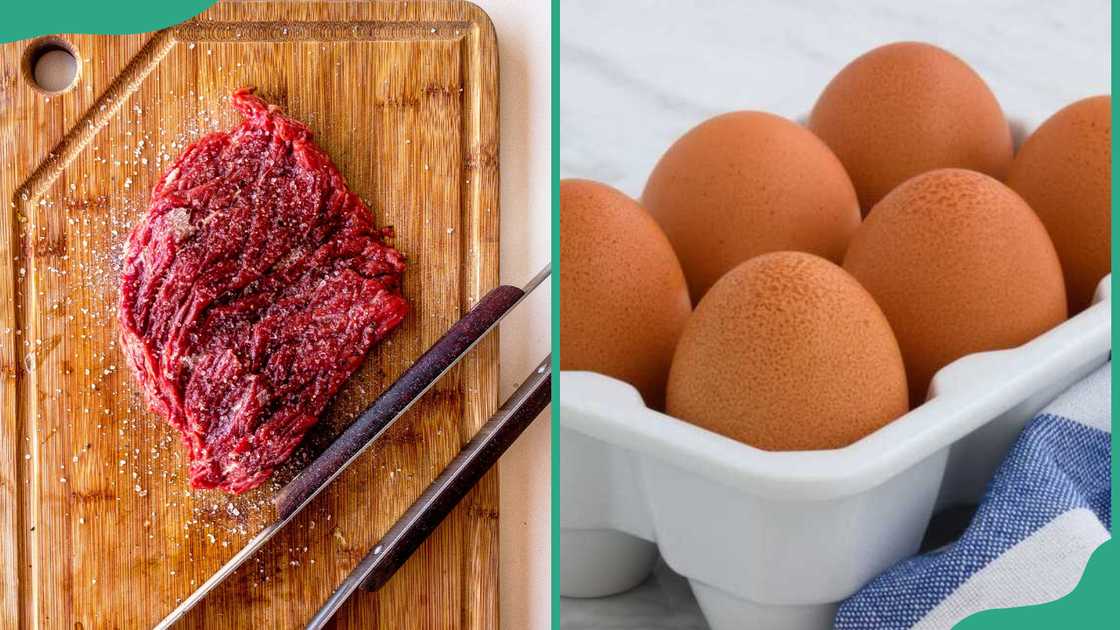 Raw meat on a board and eggs on a tray Raw meat on a board and eggs on a tray