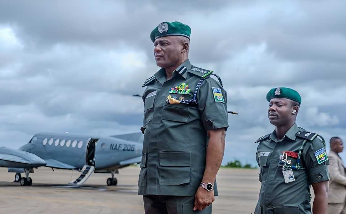 Nigerian police officers stand at attention