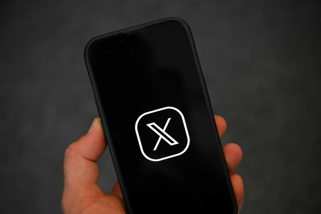 Elon Musk-owned social network X has introduced age checks as required in Britain designed to protect children from pornography but lashed out that 'oversight becomes overreach' that infinges on free expression