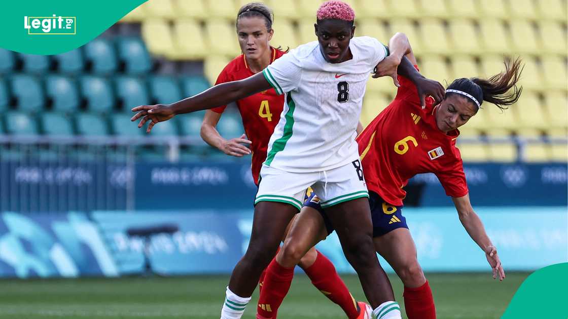 Asisat Oshoala fights for the ball with Spain's Irene Paredes and Aitana Bonmati during the Paris 2024 Olympic Games. Photo by ROMAIN PERROCHEAU Asisat Oshoala fights for the ball with Spain's Irene Paredes and Aitana Bonmati during the Paris 2024 Olympic Games. Photo by ROMAIN PERROCHEAU