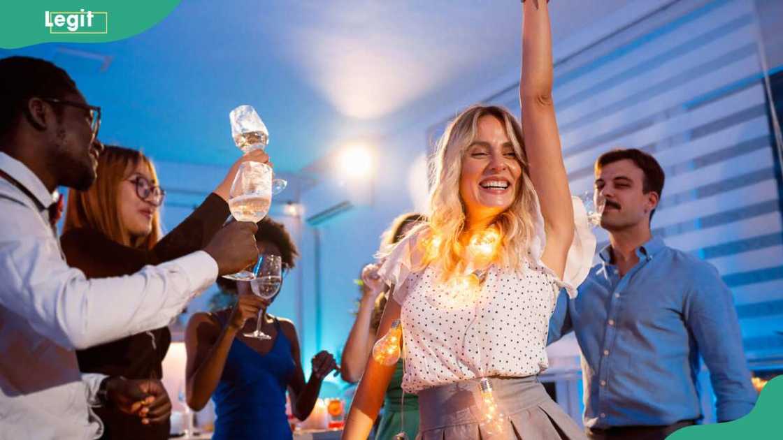 Group of multiracial people having fun during house party Group of multiracial people having fun during house party