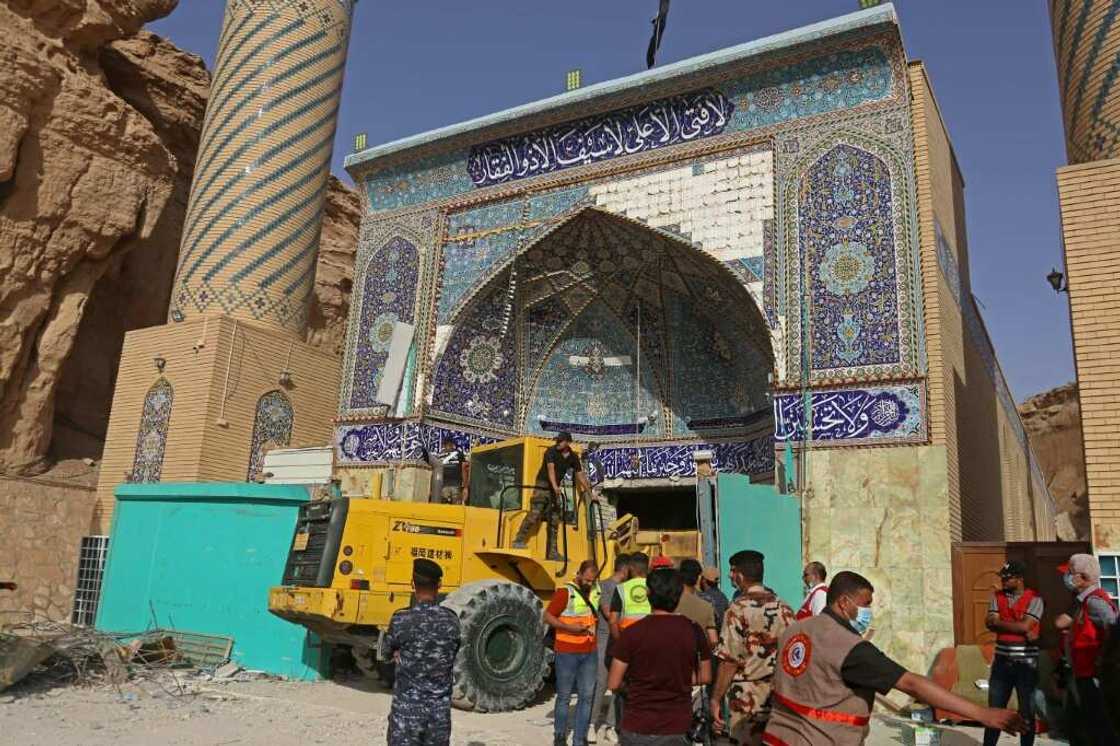 Between six and eight pilgrims had been reported trapped under the debris of the shrine, known as Qattarat al-Imam Ali, civil defence spokesman Nawas Sabah Shaker had said earlier Between six and eight pilgrims had been reported trapped under the debris of the shrine, known as Qattarat al-Imam Ali, civil defence spokesman Nawas Sabah Shaker had said earlier