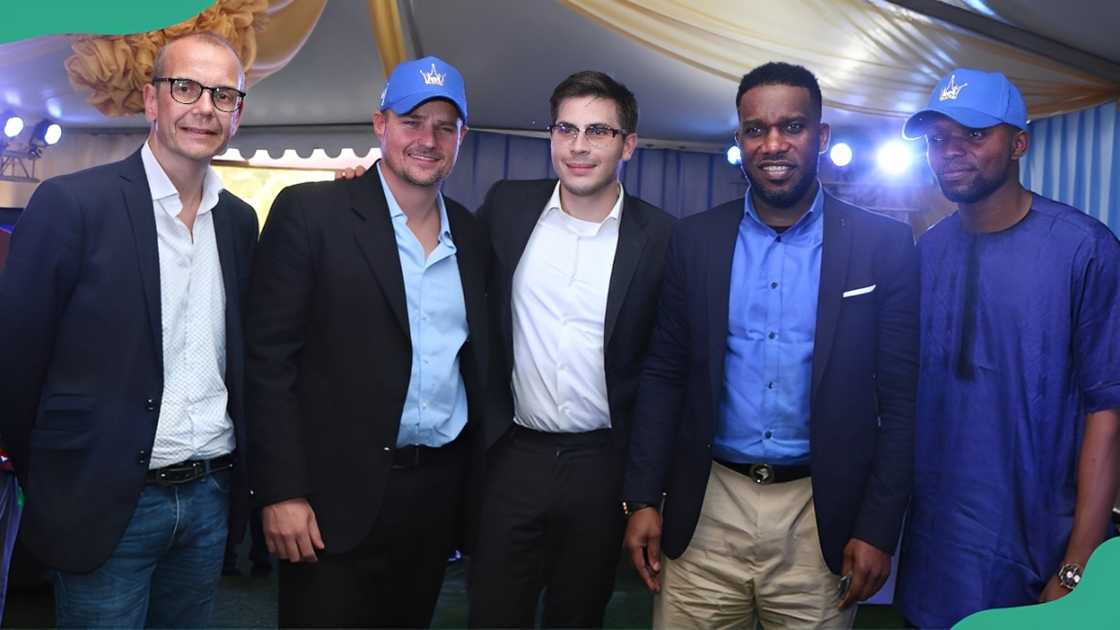 Byron Petzer poses for a photo with BetKing officials and a betting enthusiast.