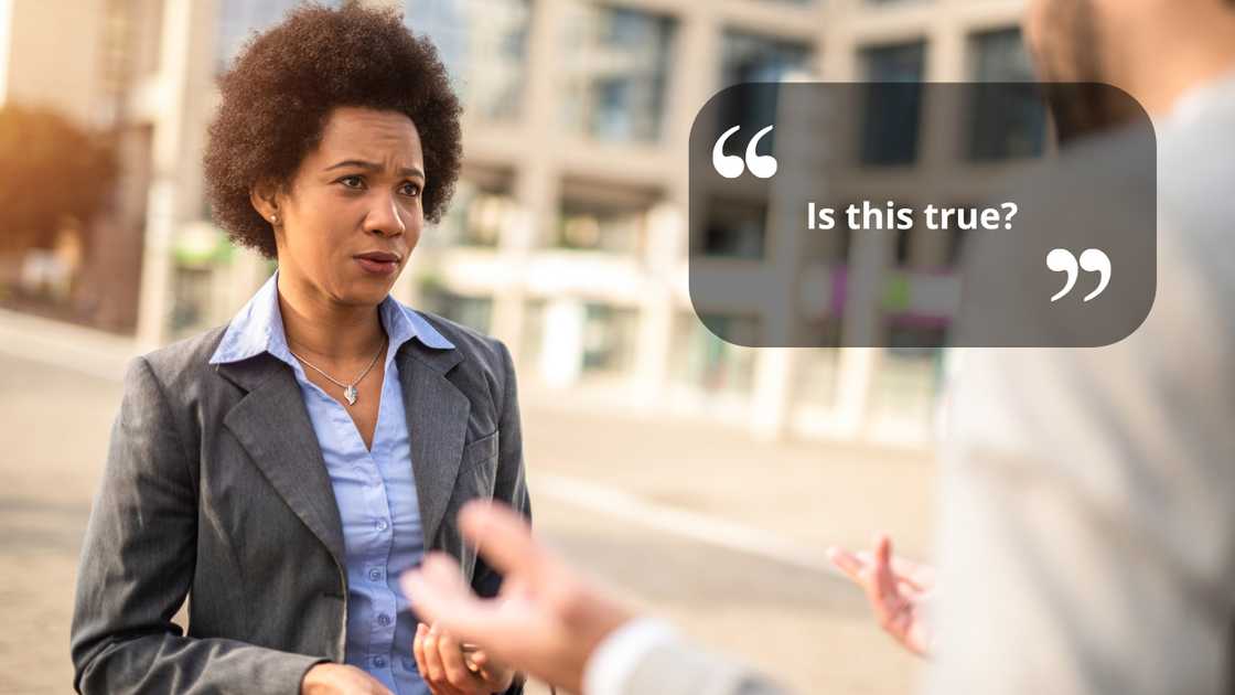 A worried woman talking to her boss