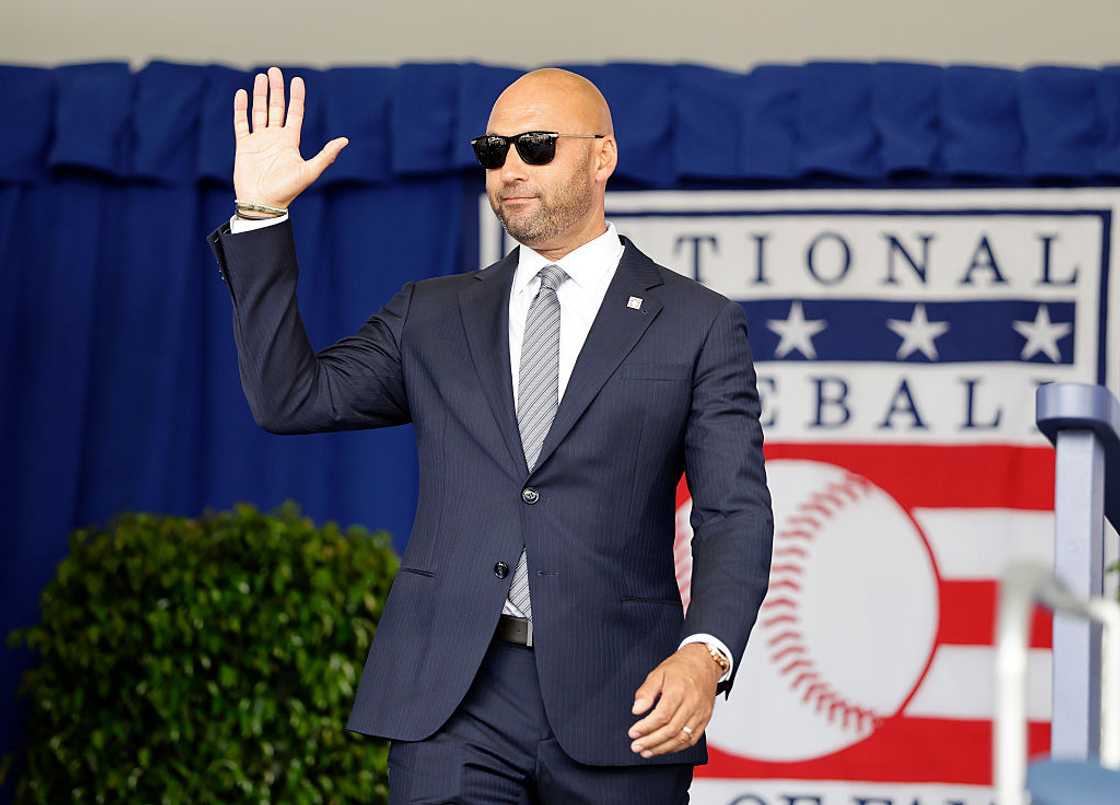 Derek Jeter waving during the Baseball Hall of Fame induction ceremony Derek Jeter waving during the Baseball Hall of Fame induction ceremony