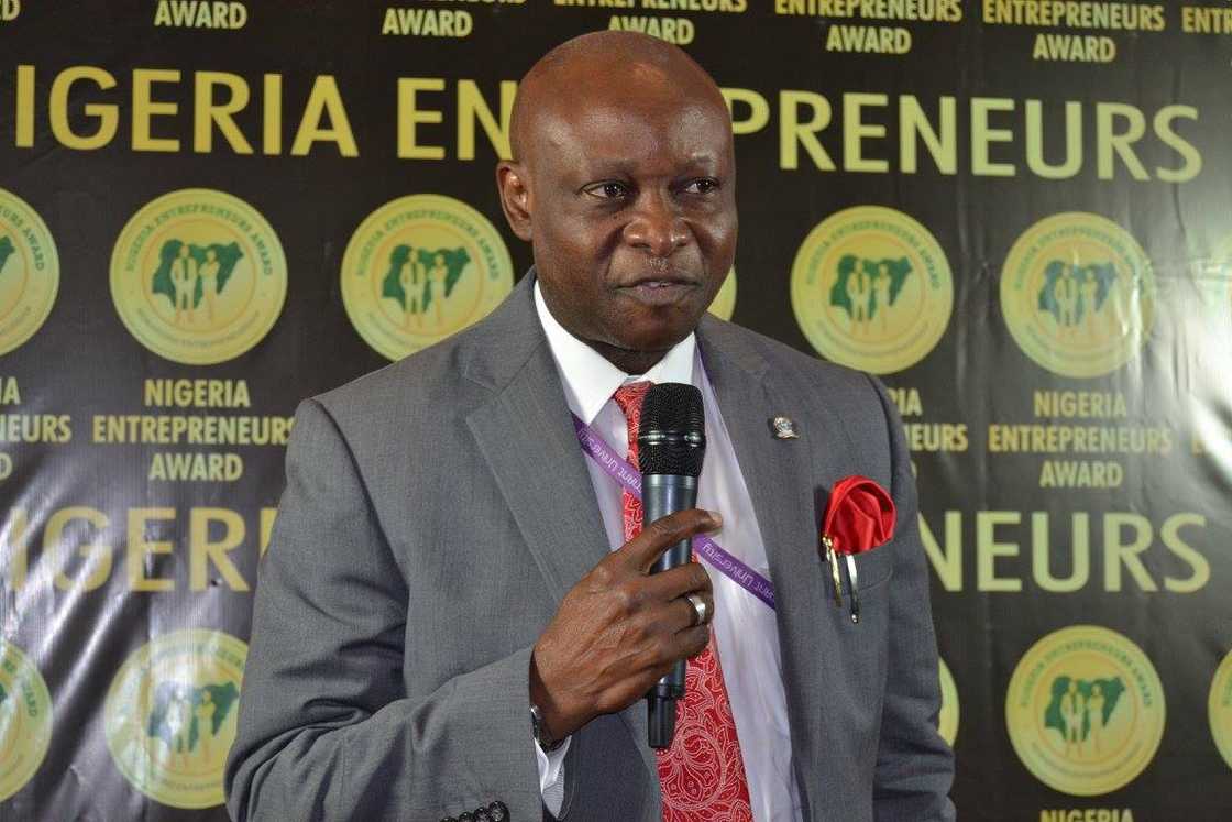 Charles Ayo talking at an event Charles Ayo talking at an event