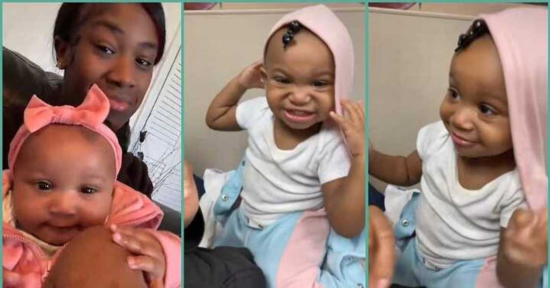 One-year-old girl sings sweetly with mum