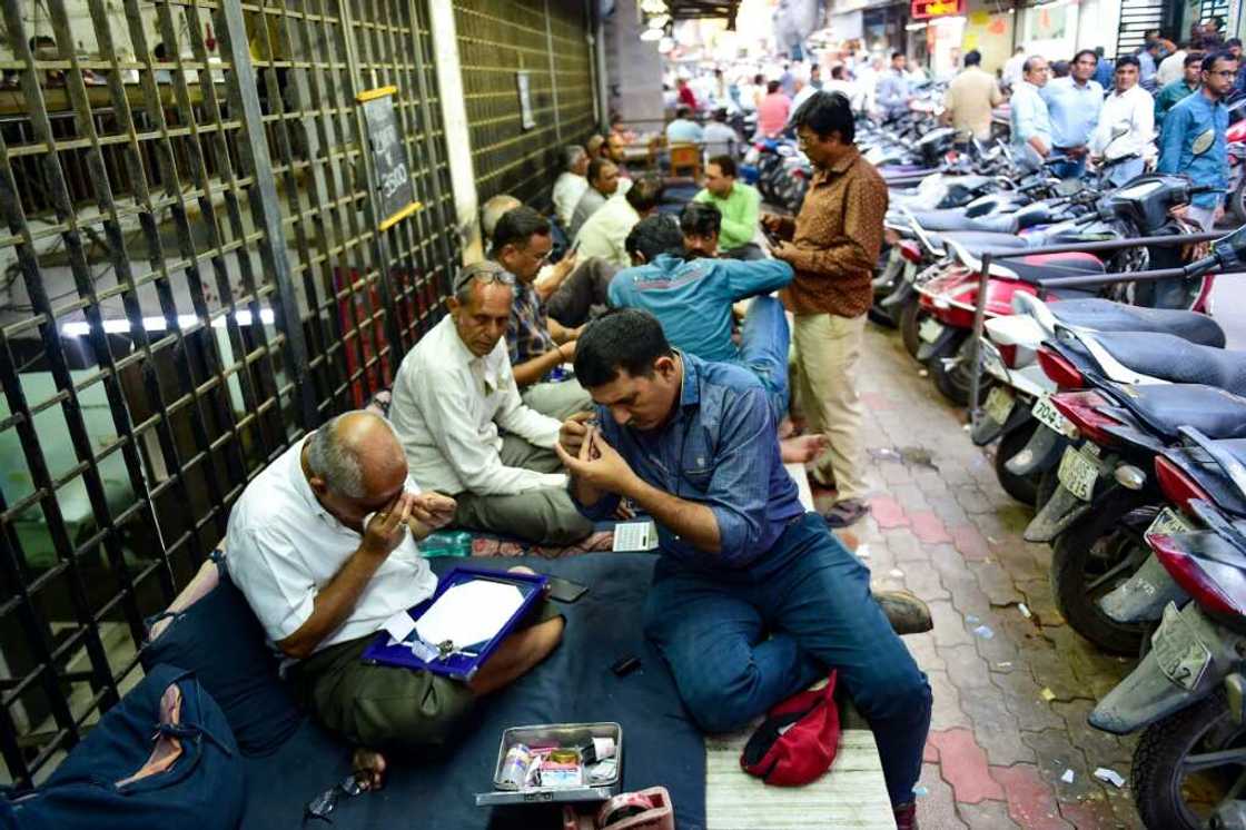 Diamond traders in the west Indian city of Surat, where 90 percent of the world's diamonds are cut and polished Diamond traders in the west Indian city of Surat, where 90 percent of the world's diamonds are cut and polished
