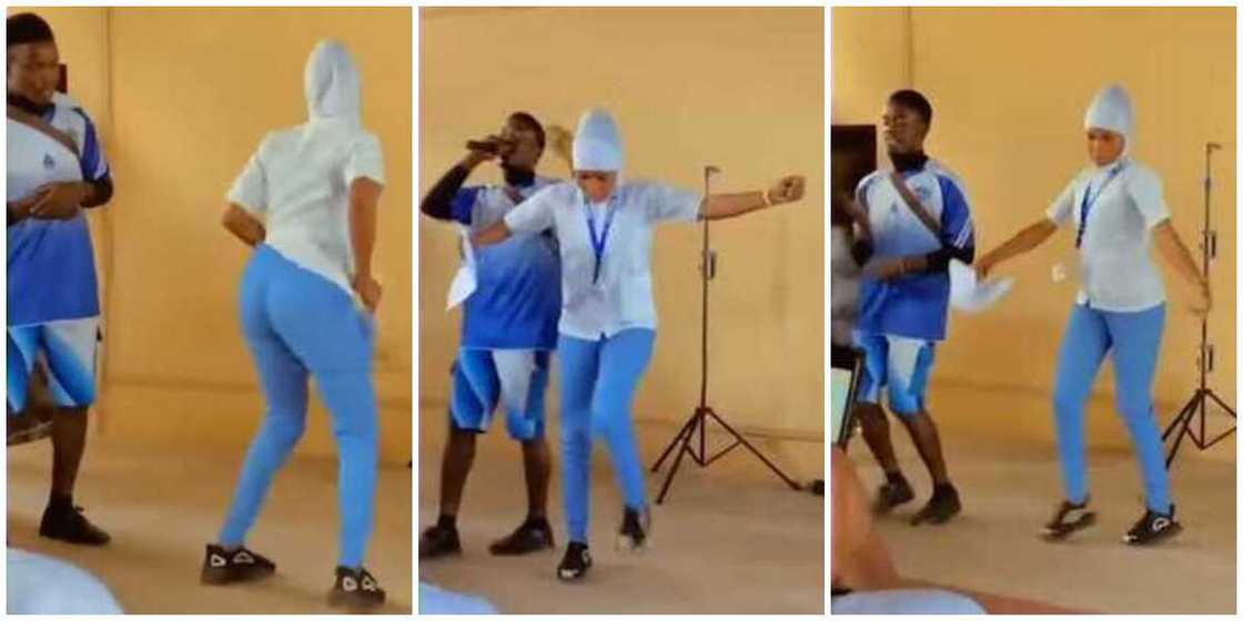 Nigerians react to video of uniformed Muslim lady in hijab doing legwork on stage