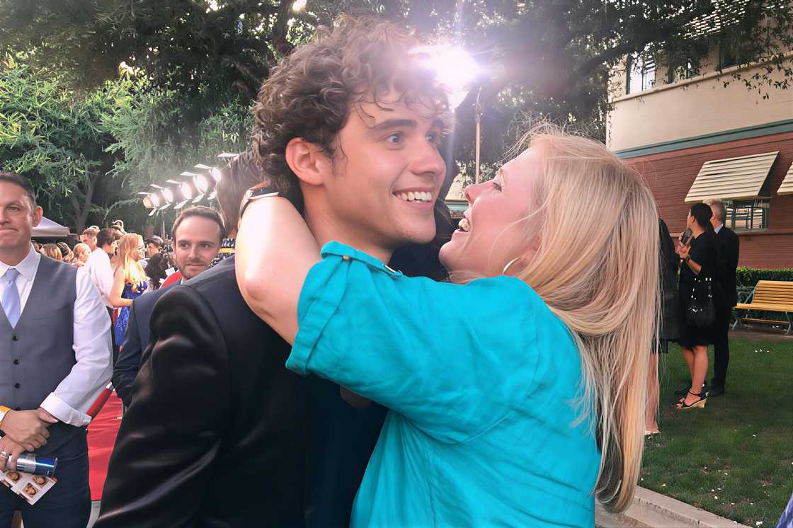 Joshua Bassett and his mother, Laura Bassett hug during the premeire of High School Musical: The Musical: The Series, Season 3. Joshua Bassett and his mother, Laura Bassett hug during the premeire of High School Musical: The Musical: The Series, Season 3.
