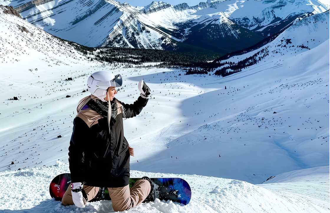 Makena White gestures while kneeling at the Lake Louise Ski Resort & Summer Gondola. Makena White gestures while kneeling at the Lake Louise Ski Resort & Summer Gondola.
