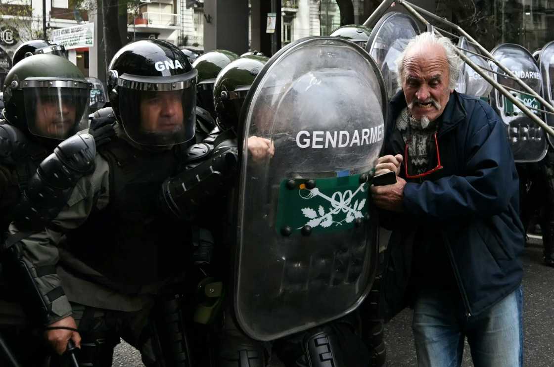 Several elderly protesters were among those who clashed with police or were detained Several elderly protesters were among those who clashed with police or were detained