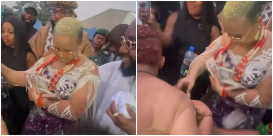 E-Money's wife prays bundles of cash E-Money's wife prays bundles of cash