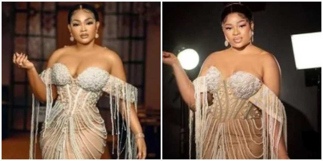 Photos of Mercy Aigbe and a lady. Photos of Mercy Aigbe and a lady.