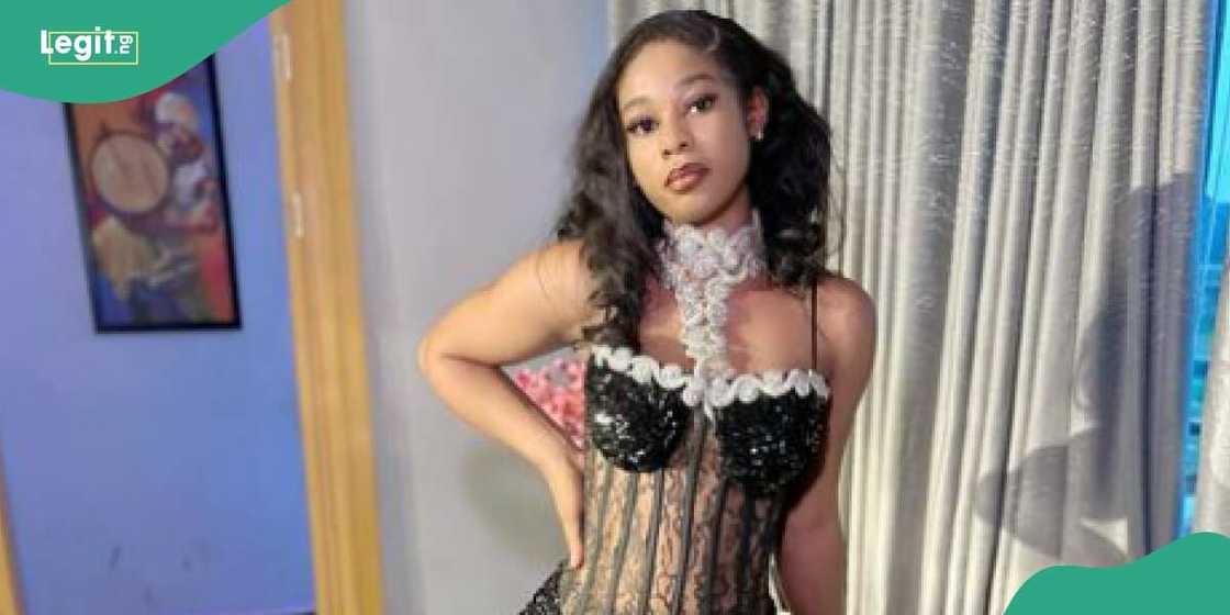 A fashion designer rocks a lovely dress A fashion designer rocks a lovely dress