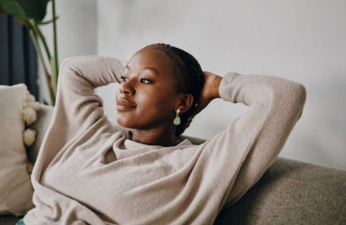 A lady in beige sweater
