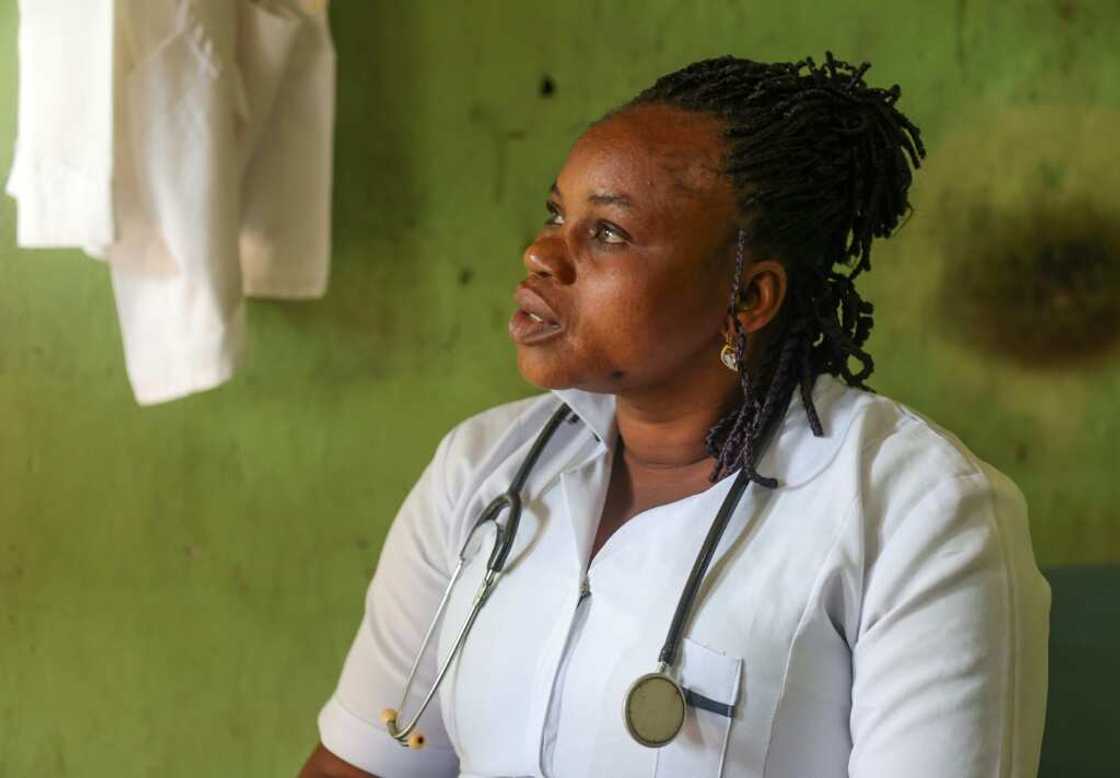 Nurse Andat Datau works at a clinic powered by solar energy in Sabon Gida village