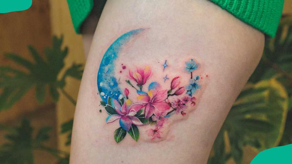 Crescent cherry blossom tattoo