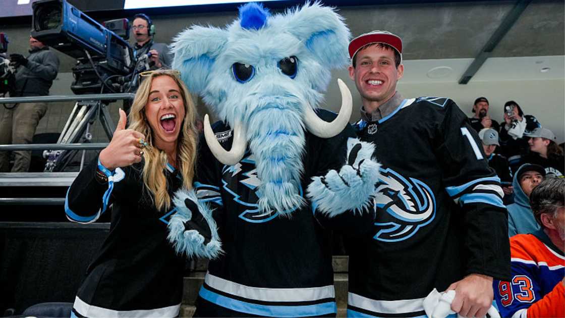 Tanner Smith, Midge Smith and Utah Mammoth mascot Tusky in Salt Lake City, Utah.