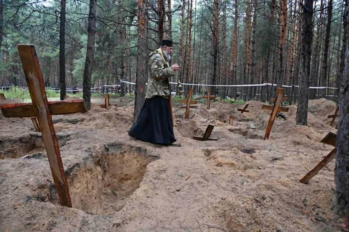 More than 440 graves were discovered near Izyum after it was recaptured from Russian forces More than 440 graves were discovered near Izyum after it was recaptured from Russian forces