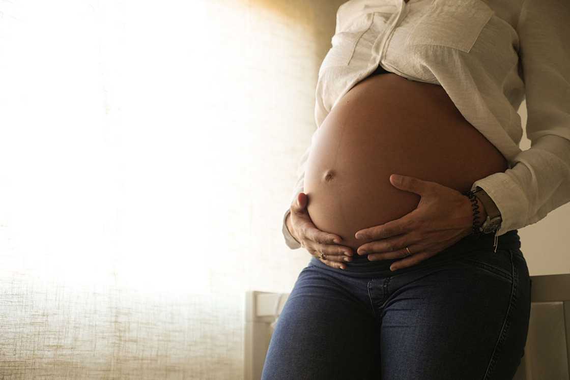 Heavily pregnant woman