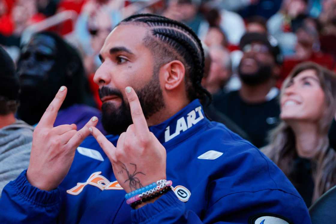 Drake attends a game between the Houston Rockets and the Cleveland Cavaliers at Toyota Centre in Houston, Texas Drake attends a game between the Houston Rockets and the Cleveland Cavaliers at Toyota Centre in Houston, Texas
