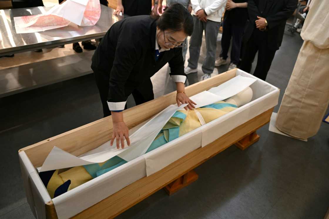 Growing numbers are finding work in the business of death as South Korea undergoes massive demographic change